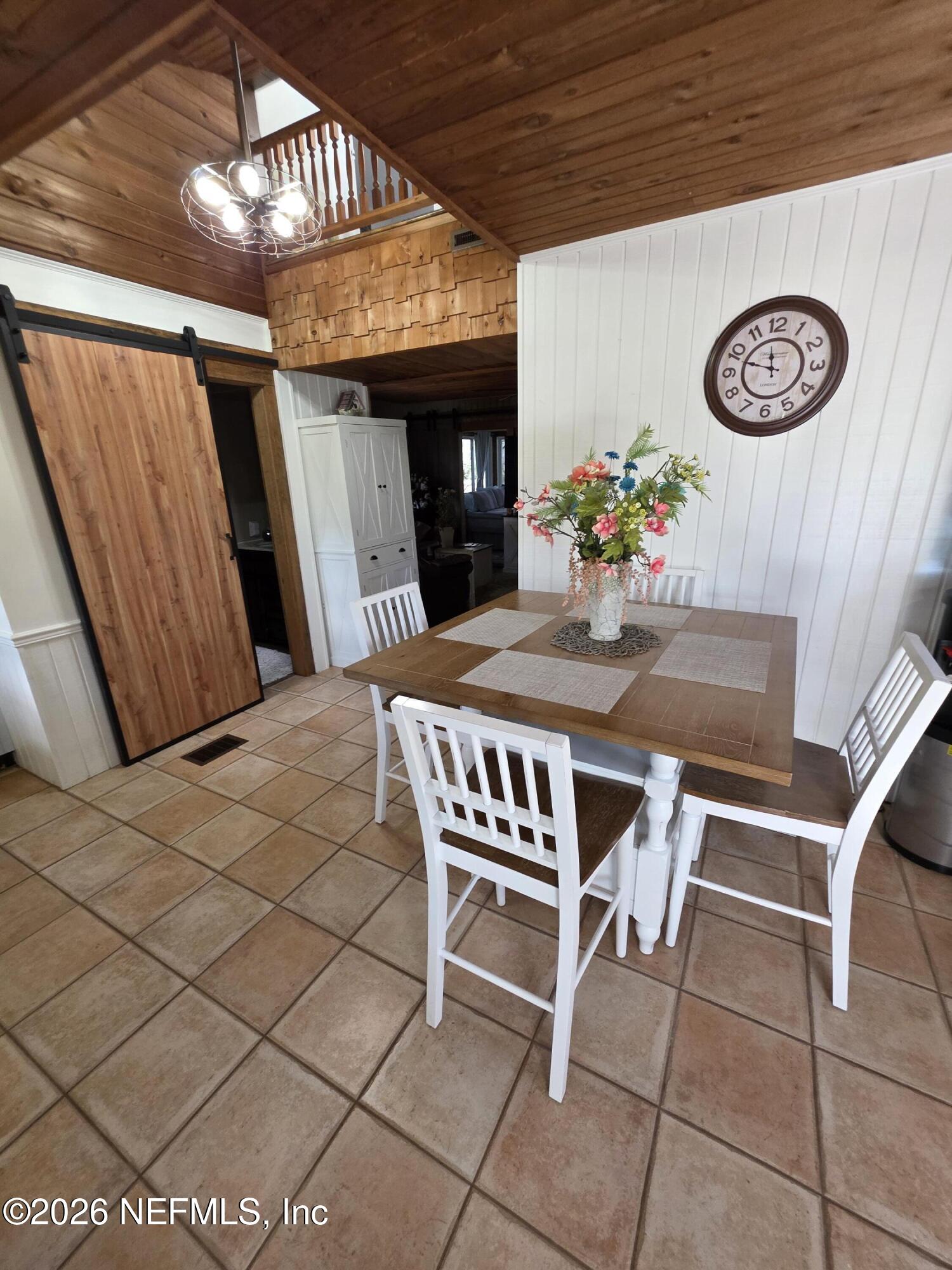 108 Creekside Road Satsuma, FL 32189 - Photo 23 of 51 a view of a dining room with furniture