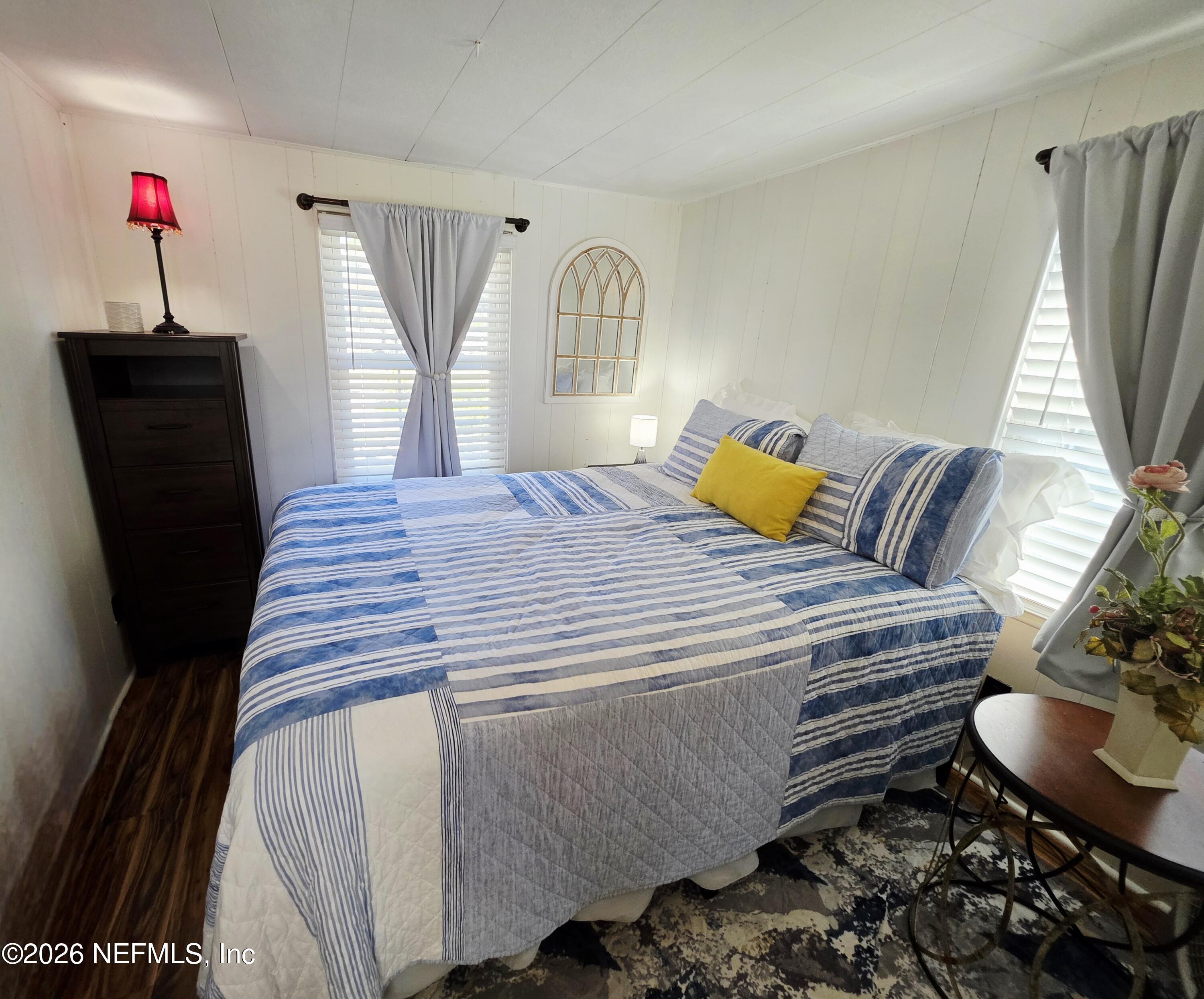 108 Creekside Road Satsuma, FL 32189 - Photo 46 of 51 a bedroom with a bed dresser and a window