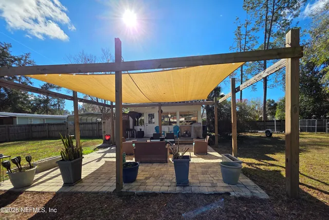 an aerial view of lake residential house with outdoor space