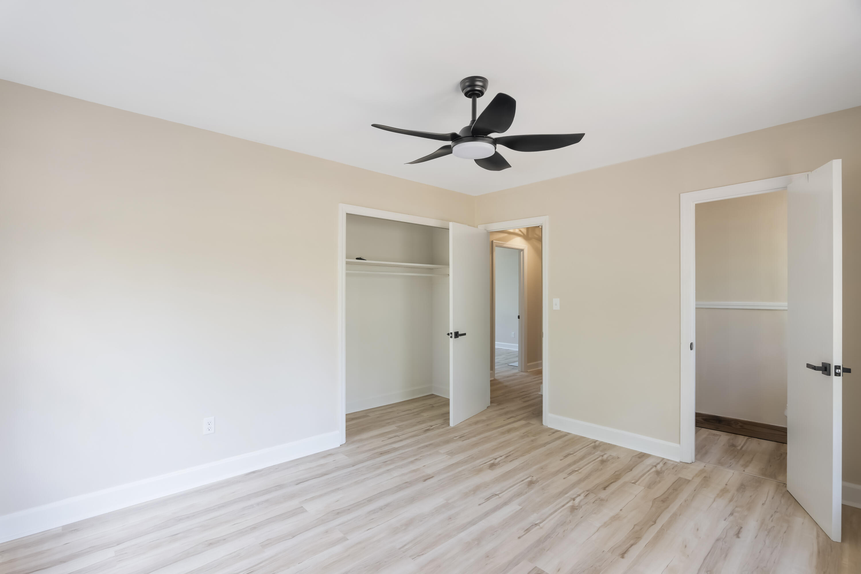 39 Gantt Street Wagener, SC 29164 - Photo 15 of 30 a view of room with wooden floor and ceiling fan