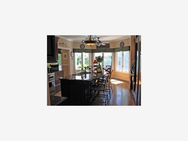 782 Covington Road Los Altos, CA 94024 - Photo 5 of 9 a living room with furniture and a large window