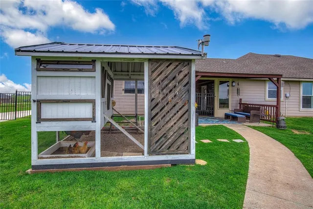 a view of a backyard with a tub