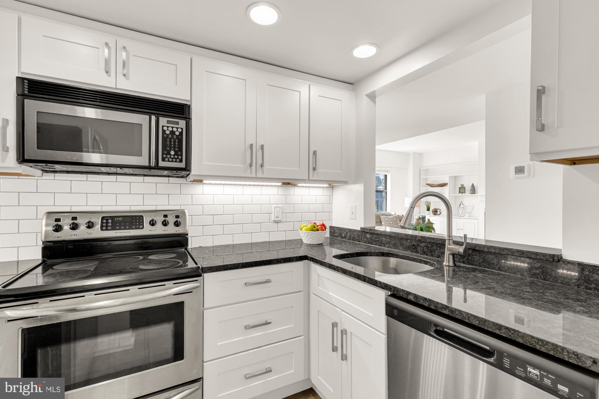 1727 R Street Northwest, Unit 402 Washington, DC 20009 - Photo 11 of 35 Kitchen with Under Cabinet Bright Task Lighting