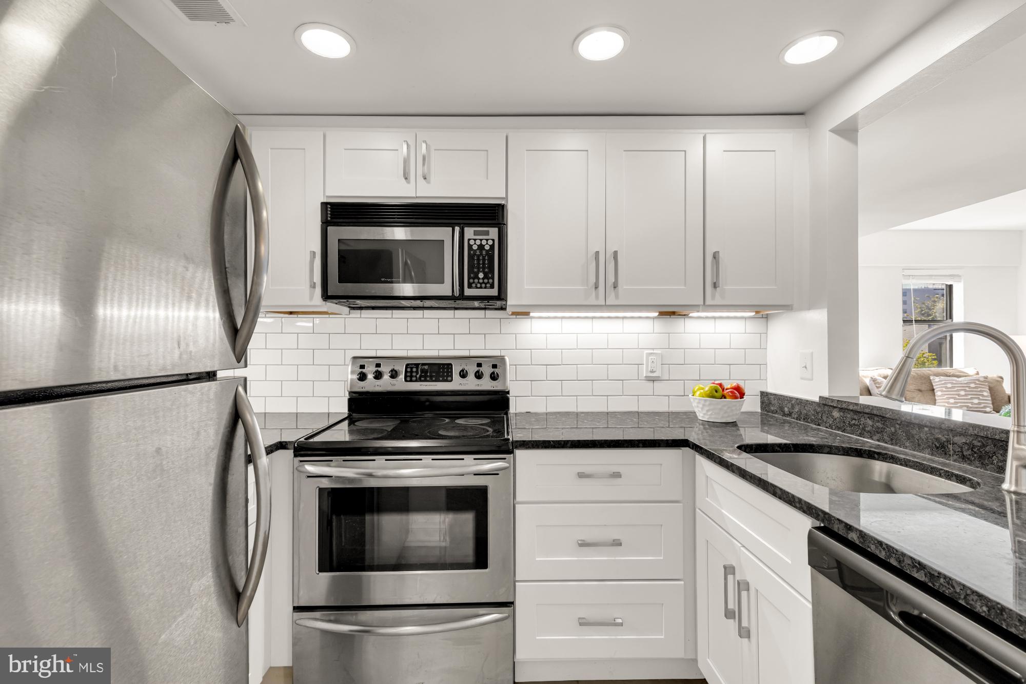1727 R Street Northwest, Unit 402 Washington, DC 20009 - Photo 12 of 35 Kitchen with Granite Countertops