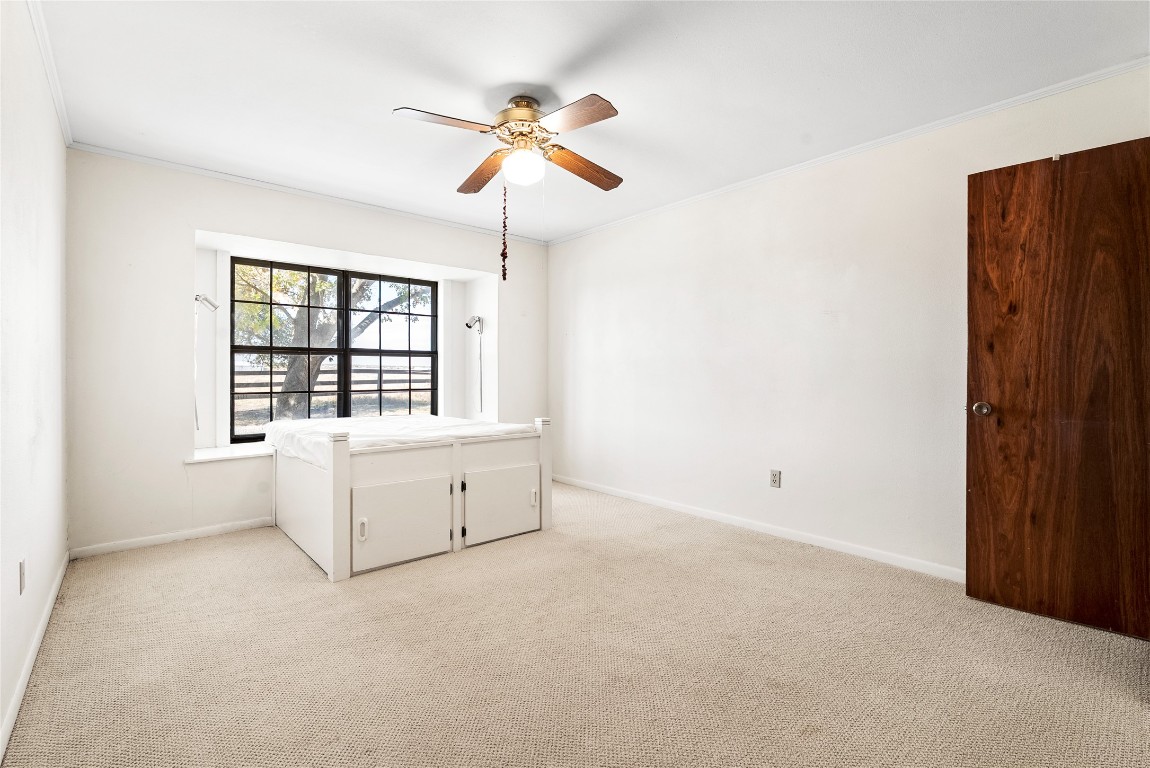 12914 Pfluger Berkman Road Coupland, TX 78615 - Photo 14 of 39 an empty room with windows