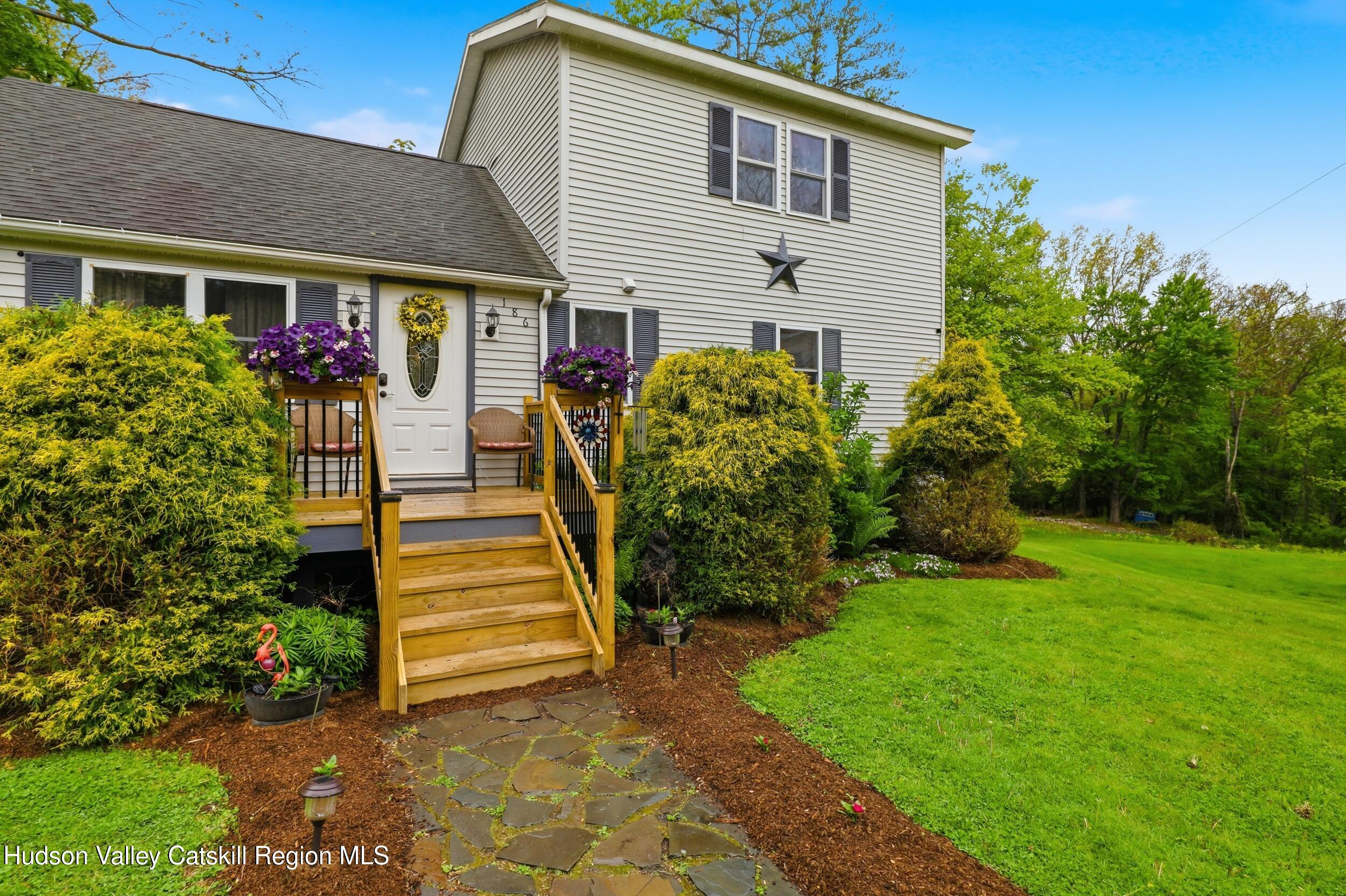186 Cedar Hill Road High Falls, NY 12440 - Photo 5 of 33 a front view of a house with garden