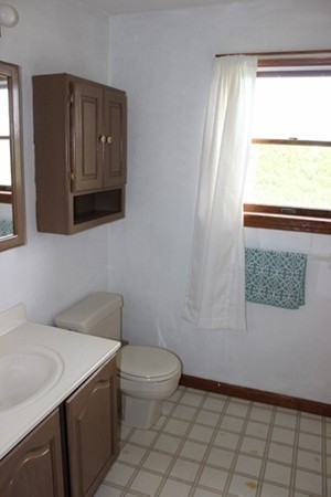 500 Hadley Road Sunderland, MA 01375 - Photo 20 of 22 a bathroom with a toilet a sink and a mirror