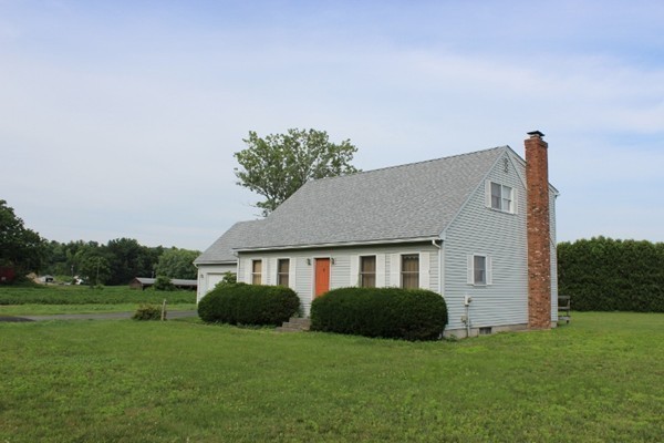 500 Hadley Road Sunderland, MA 01375 - Photo 4 of 22 a front view of a house with a yard