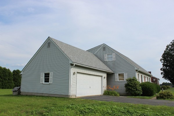 500 Hadley Road Sunderland, MA 01375 - Photo 5 of 22 a front view of house with yard and green space