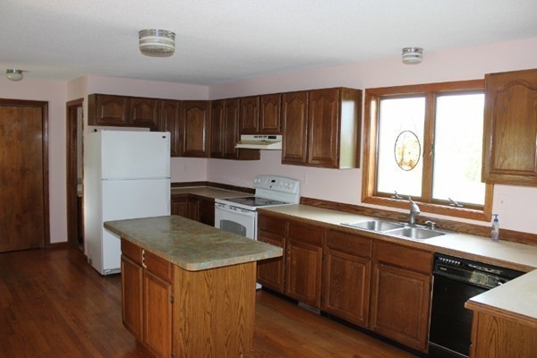 500 Hadley Road Sunderland, MA 01375 - Photo 9 of 22 a kitchen with a refrigerator sink and cabinets