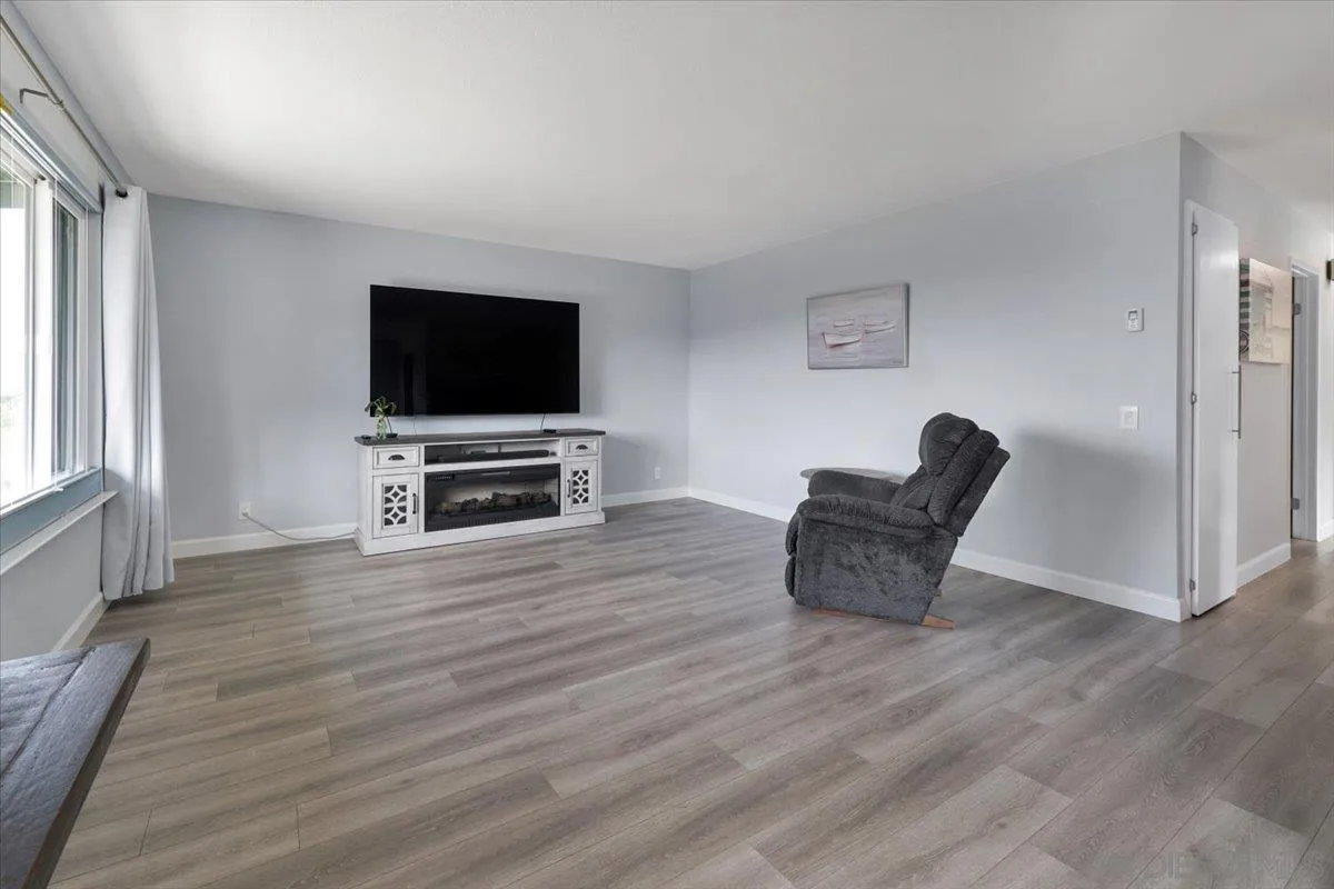 4436 Skimmer Way Oceanside, CA 92057 - Photo 13 of 71 a living room with furniture and a flat screen tv