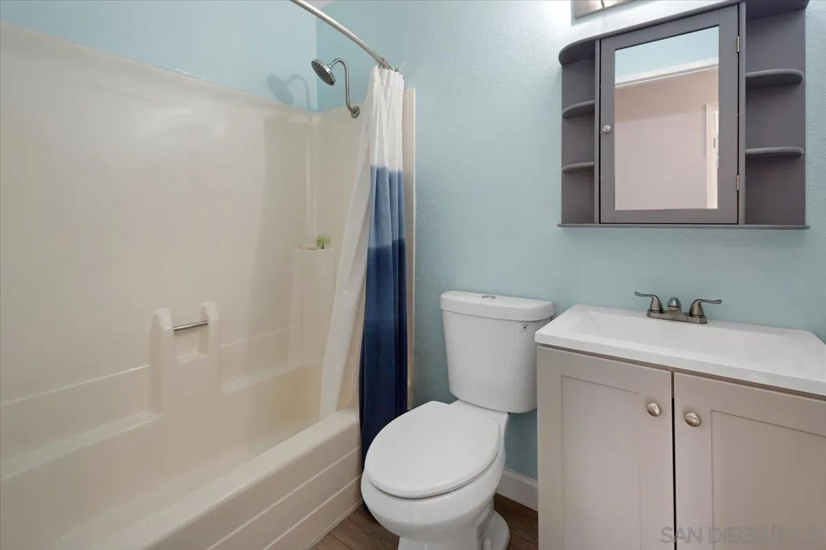4436 Skimmer Way Oceanside, CA 92057 - Photo 26 of 71 a bathroom with a sink a toilet and shower
