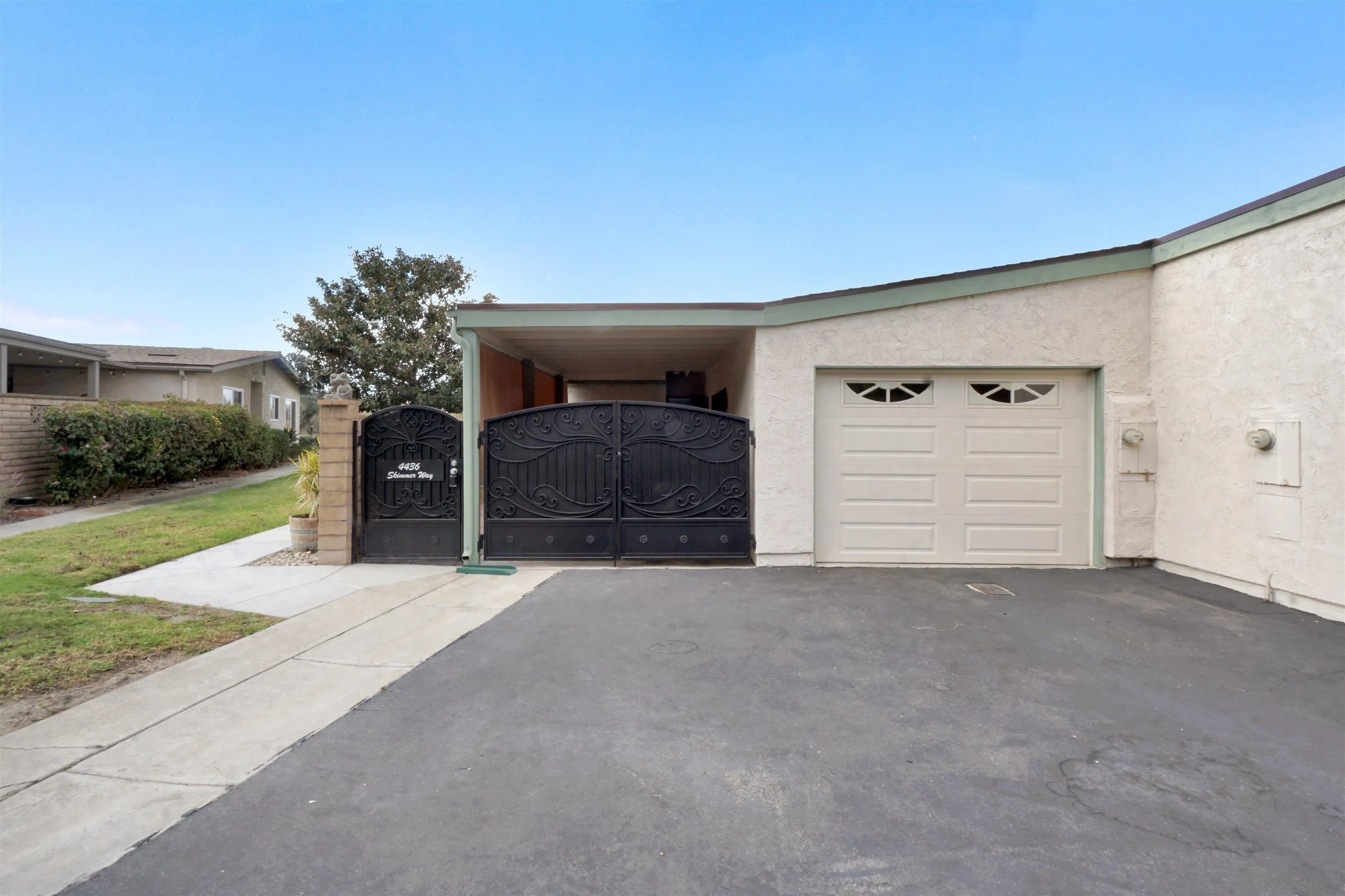4436 Skimmer Way Oceanside, CA 92057 - Photo 43 of 71 a view of a house with a yard and garage