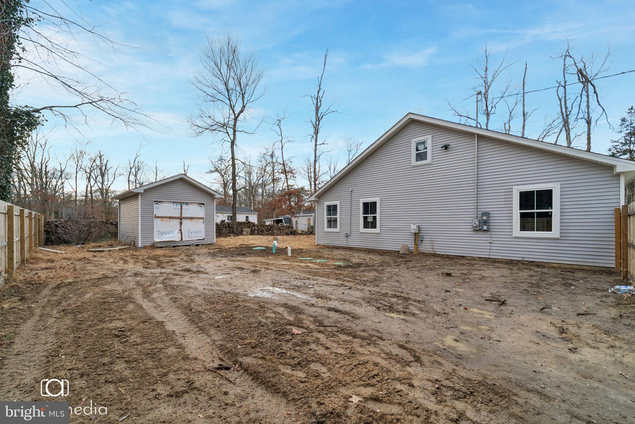 303 Gooseberry Road Millville, NJ 08332 - Photo 19 of 22 a view of a house with a yard