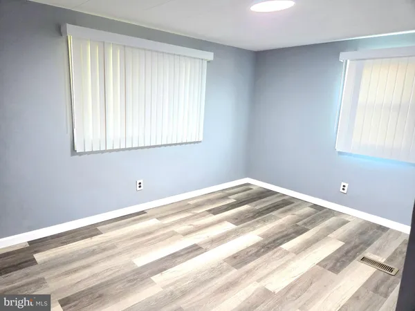 a view of a bedroom with window