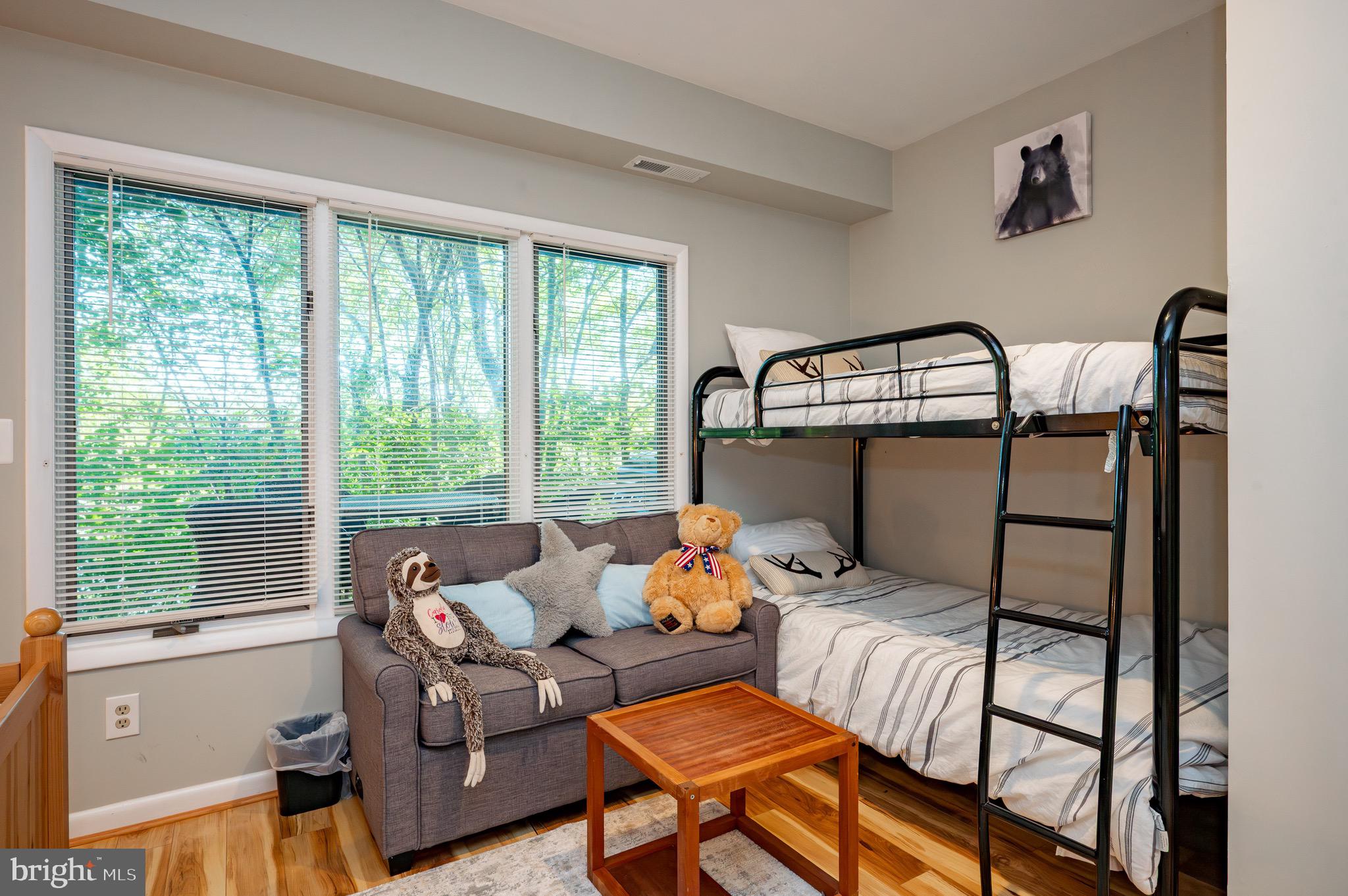257 Marsh Hill Road, Unit 44 McHenry, MD 21541 - Photo 27 of 50 a bedroom with furniture and a window