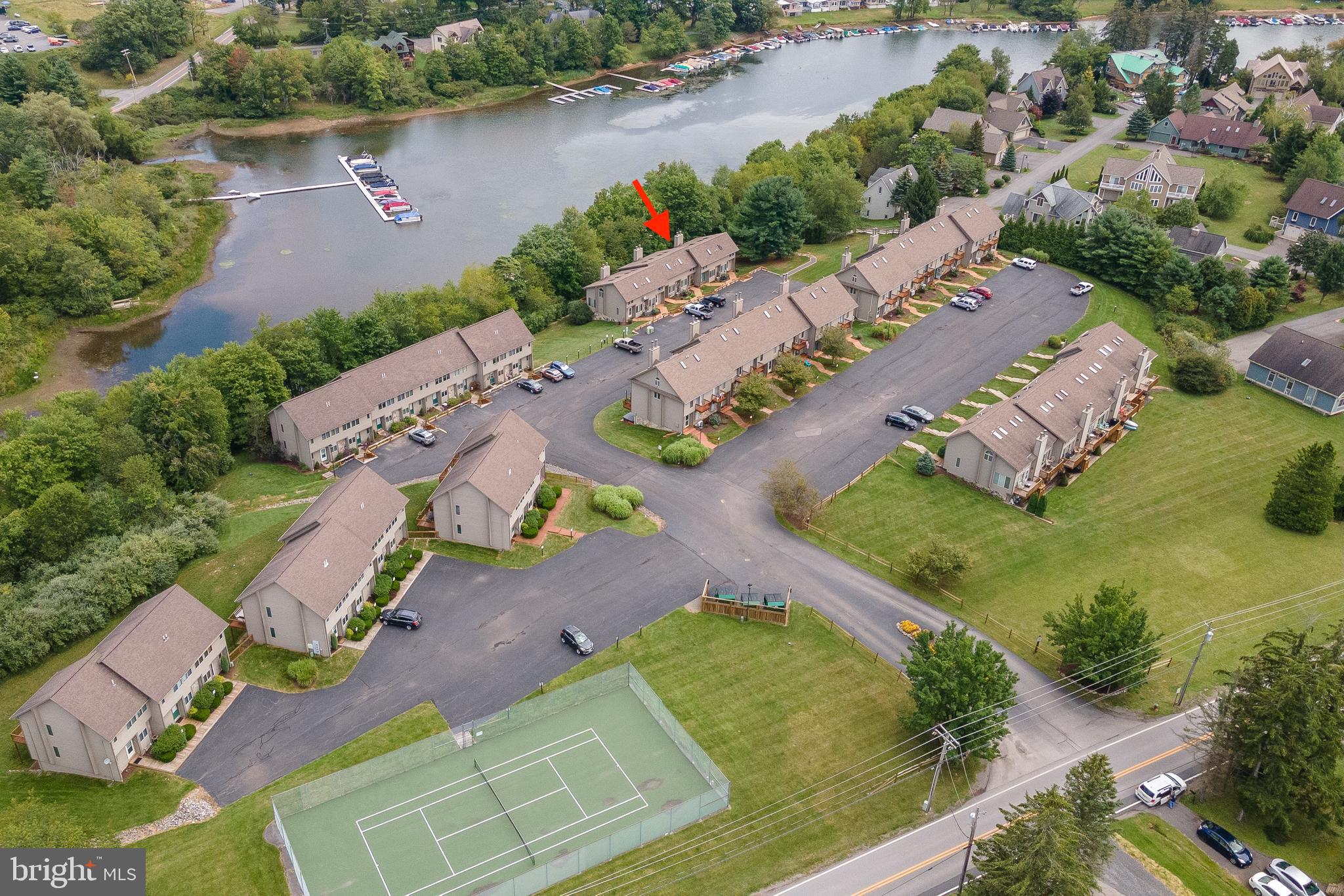 257 Marsh Hill Road, Unit 44 McHenry, MD 21541 - Photo 3 of 50 an aerial view of a house with a swimming pool and outdoor space