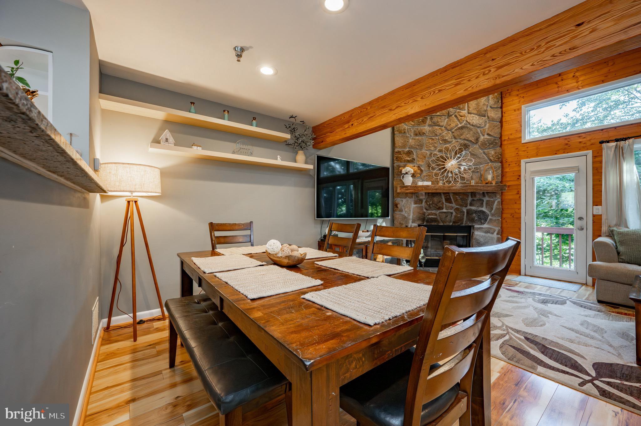 257 Marsh Hill Road, Unit 44 McHenry, MD 21541 - Photo 7 of 50 a dining room with furniture window and wooden floor