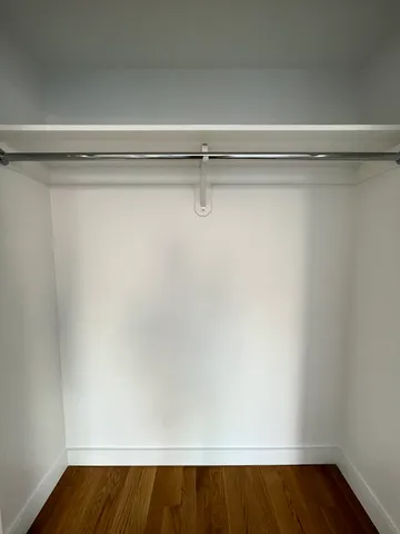 a view of small space with racks on the wall