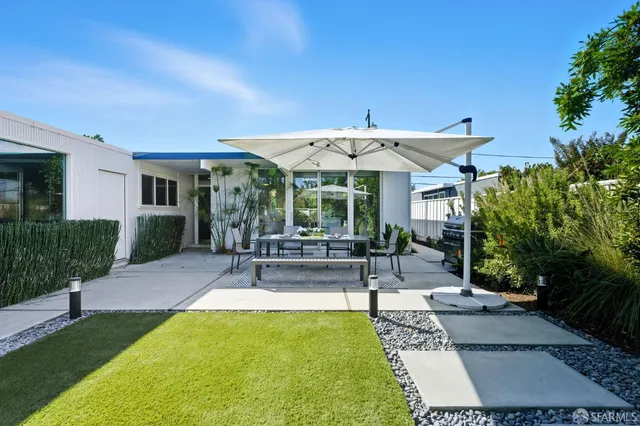 a view of hallway with livingroom