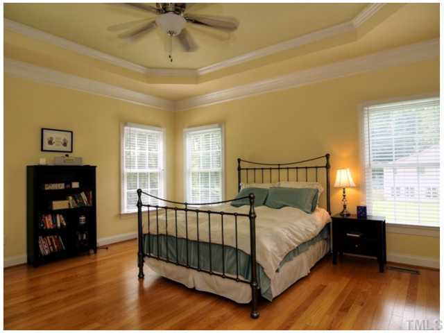 2809 Cowley Road Cary, NC 27518 - Photo 11 of 25 Main Floor Master with Hardwoods, Double Trey Ceiling with moldings, lots of natural light with the windows, neutral paint.