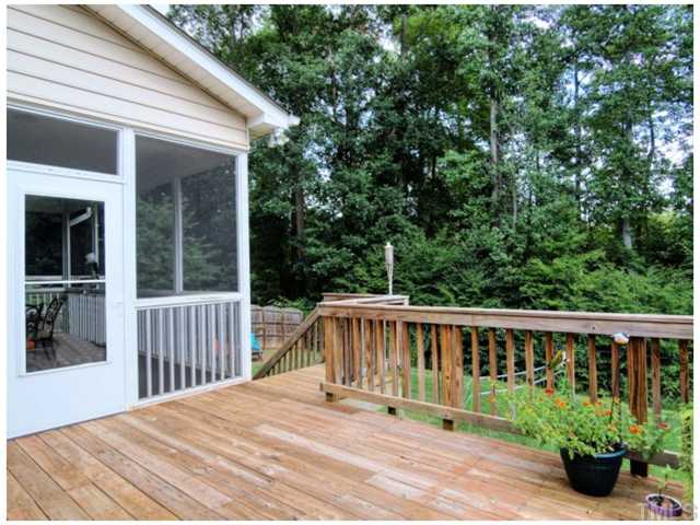 2809 Cowley Road Cary, NC 27518 - Photo 16 of 25 Deck off Screened Porch for Gill, Herb Garden