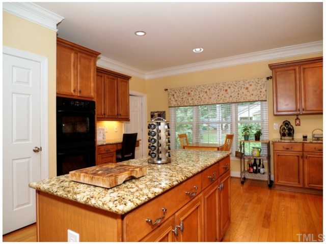 2809 Cowley Road Cary, NC 27518 - Photo 6 of 25 Breakfast Nook in the Kitchen as well as a desk area for looking up recipes on the laptop or sorting mail. Double Wall ovens, large pantry, access to the bonus room and laundry and garage.