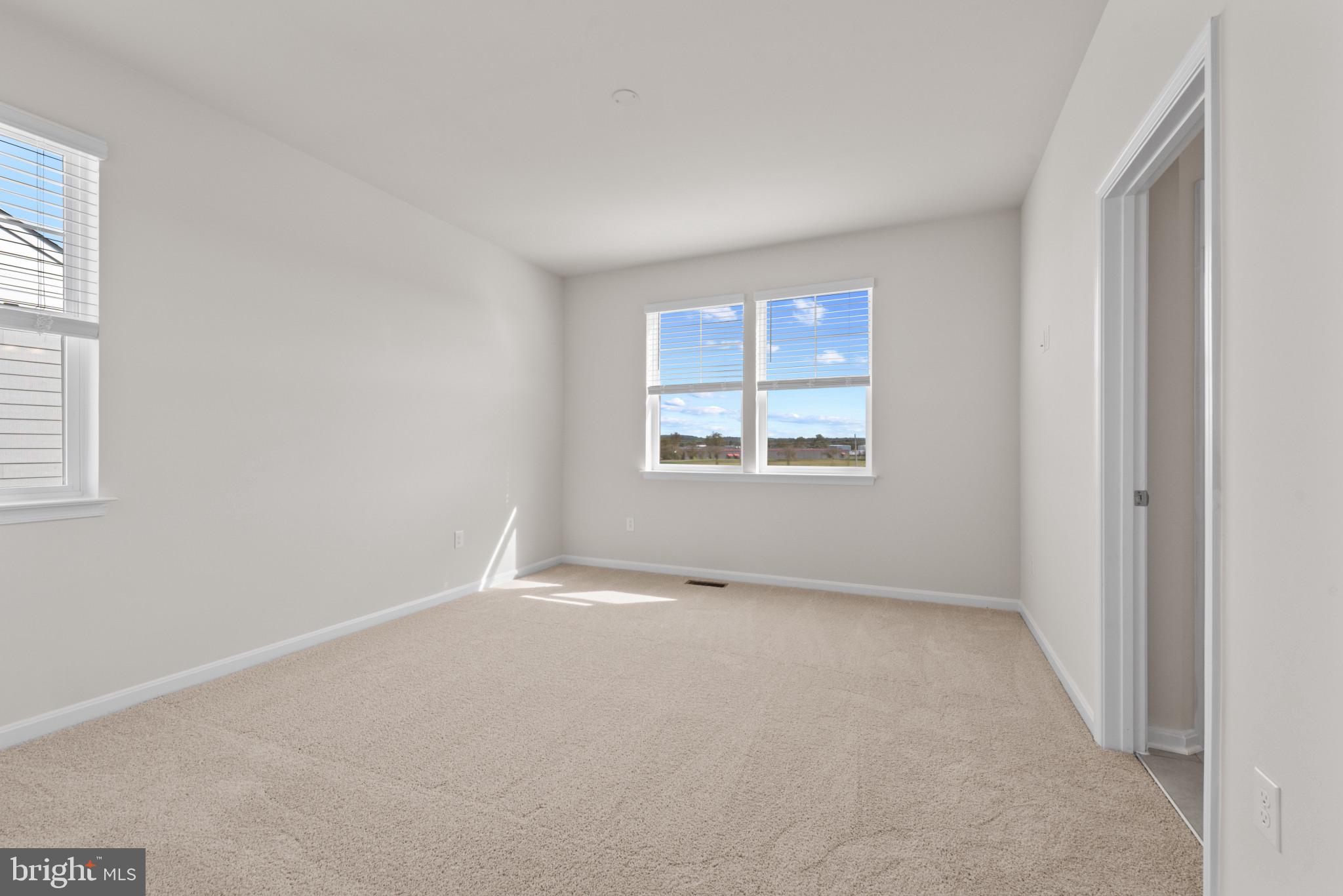 329 Ensemble Way Frederick, MD 21701 - Photo 28 of 40 an empty room with windows