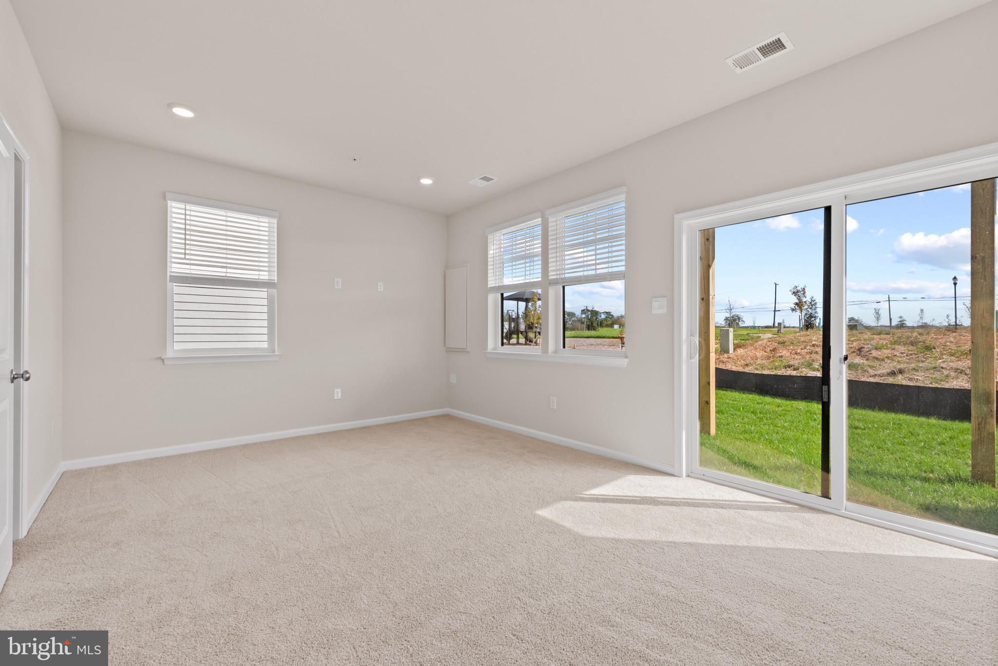 329 Ensemble Way Frederick, MD 21701 - Photo 4 of 40 a view of an empty room with a window