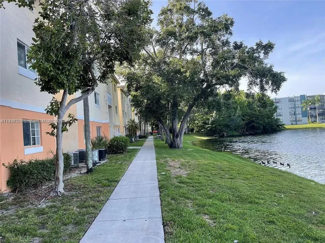 a lake view with a garden