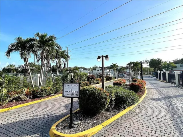 an aerial view of a house with outdoor space