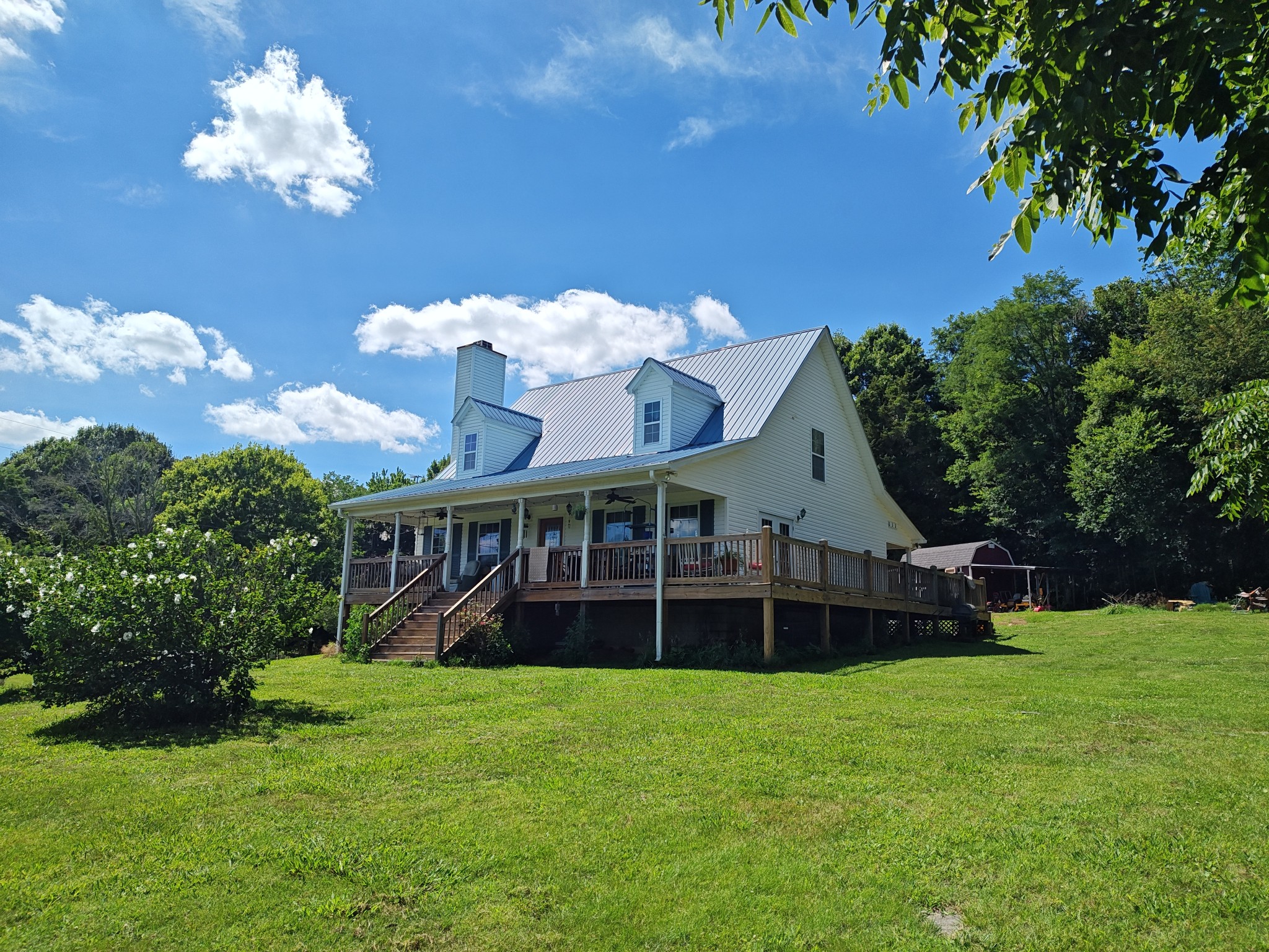 2770 Beech Log Road Watertown, TN 37184 - Photo 2 of 87 a view of a house with a backyard porch and sitting area
