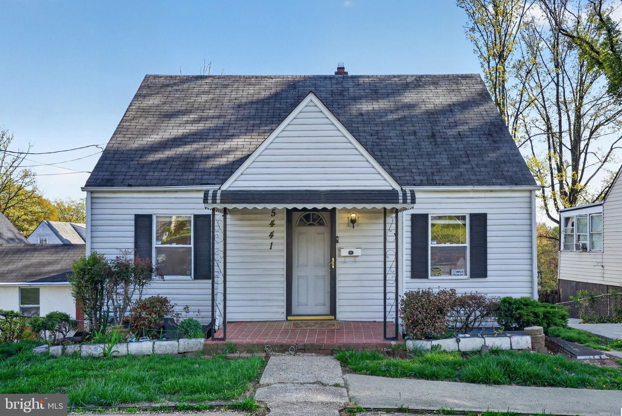 5441 Taussig Road Bladensburg, MD 20710 - Photo 1 of 37 a front view of a house with a garden