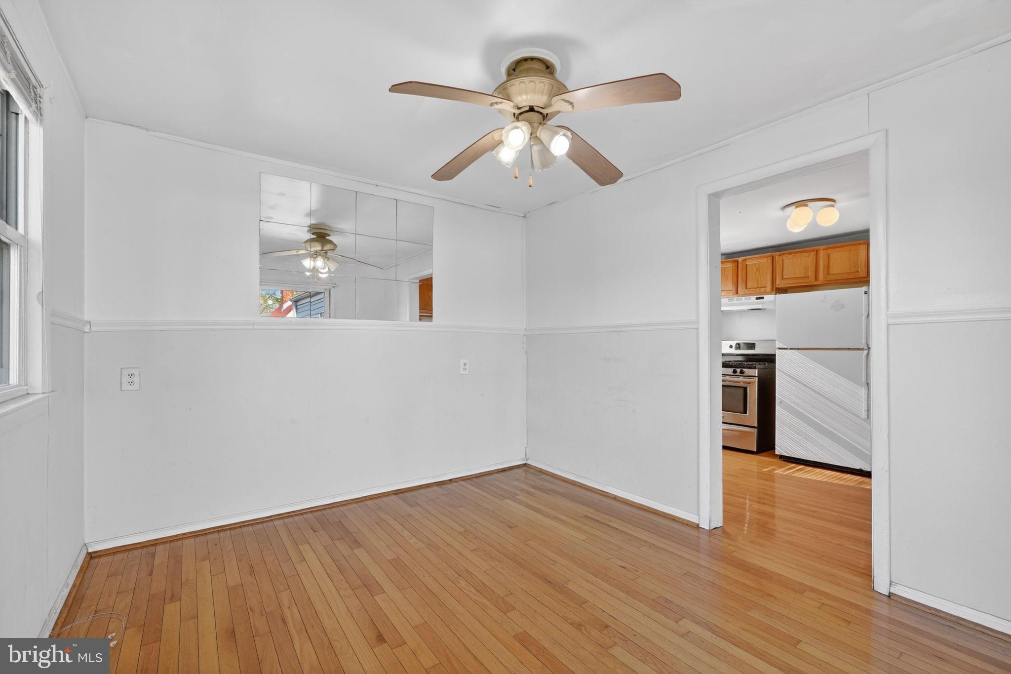 5441 Taussig Road Bladensburg, MD 20710 - Photo 13 of 37 a view of empty room with wooden floor