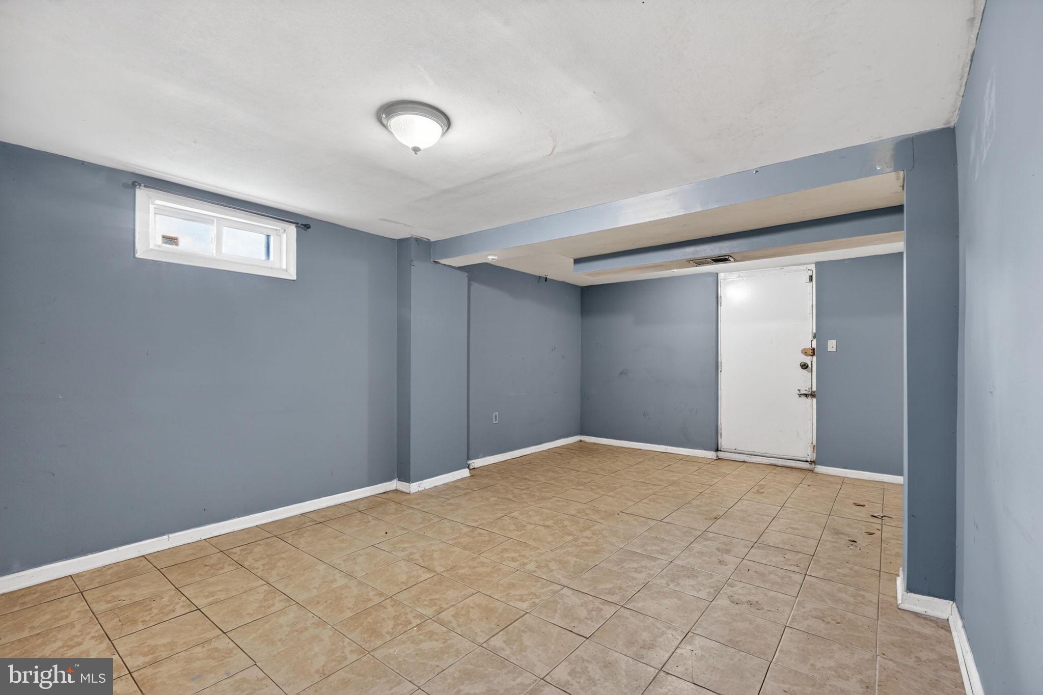 5441 Taussig Road Bladensburg, MD 20710 - Photo 22 of 37 a view of an empty room and window