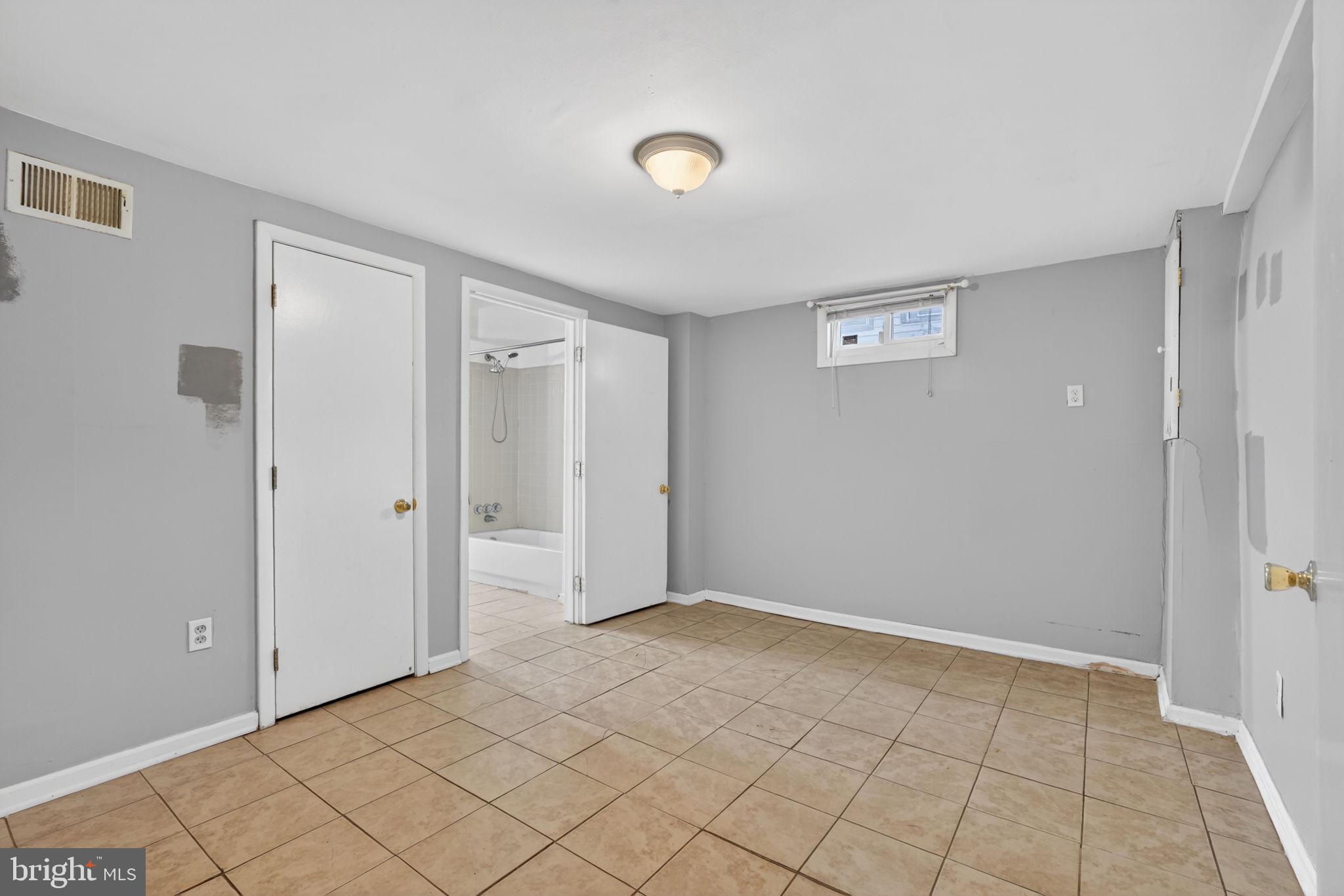 5441 Taussig Road Bladensburg, MD 20710 - Photo 25 of 37 a view of an empty room and window