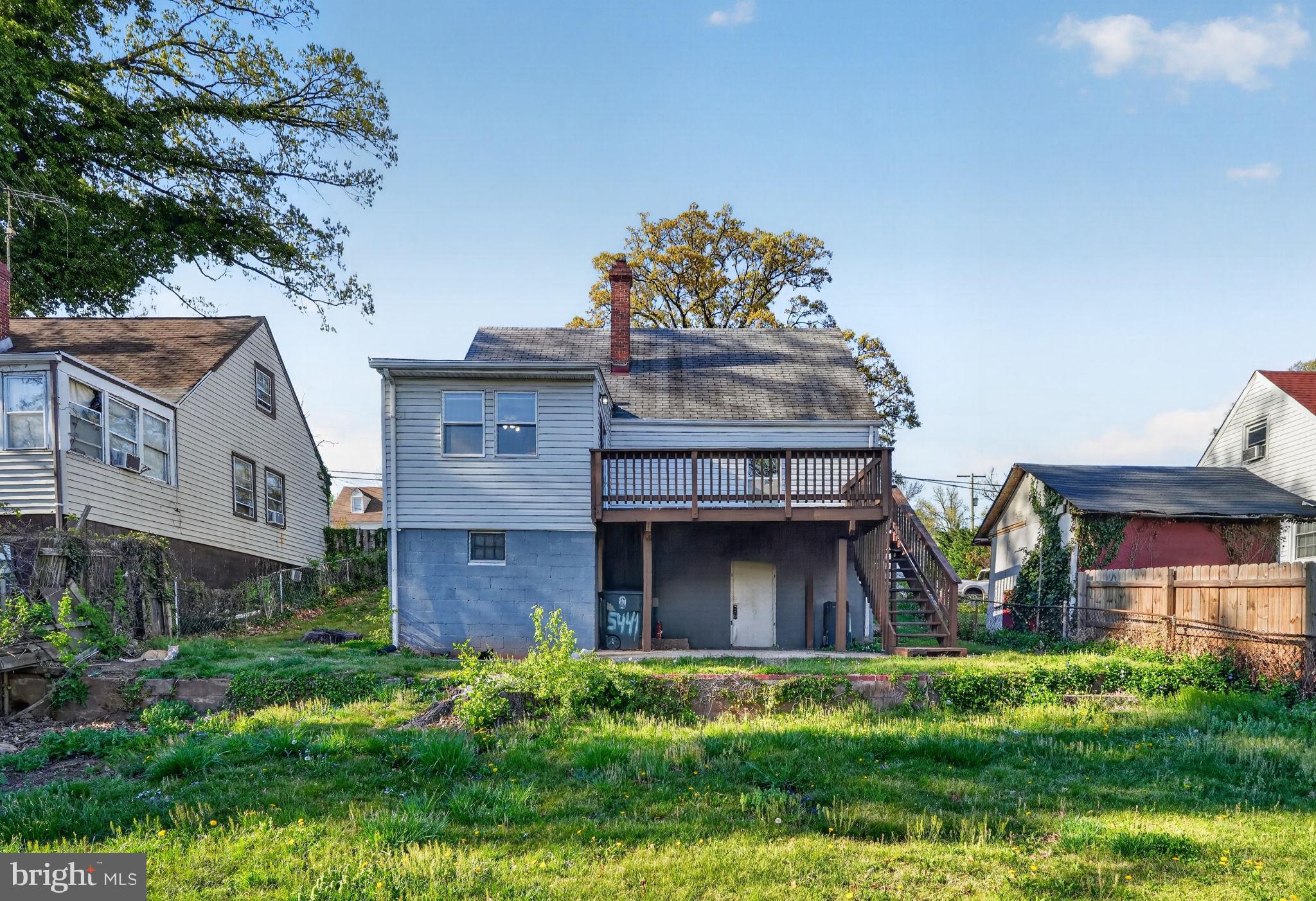 5441 Taussig Road Bladensburg, MD 20710 - Photo 32 of 37 a front view of a house with a garden