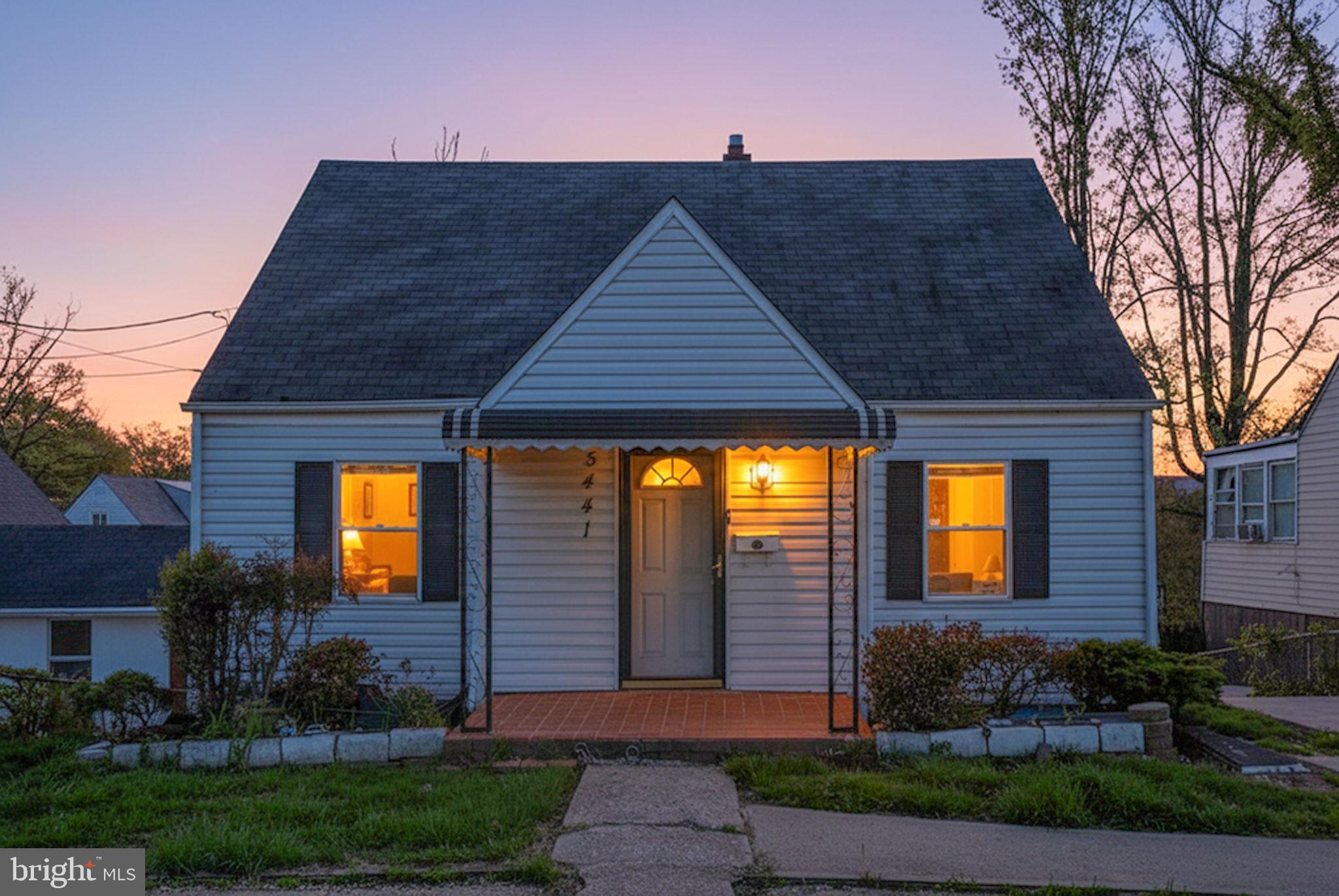 5441 Taussig Road Bladensburg, MD 20710 - Photo 37 of 37 a front view of a house with a yard