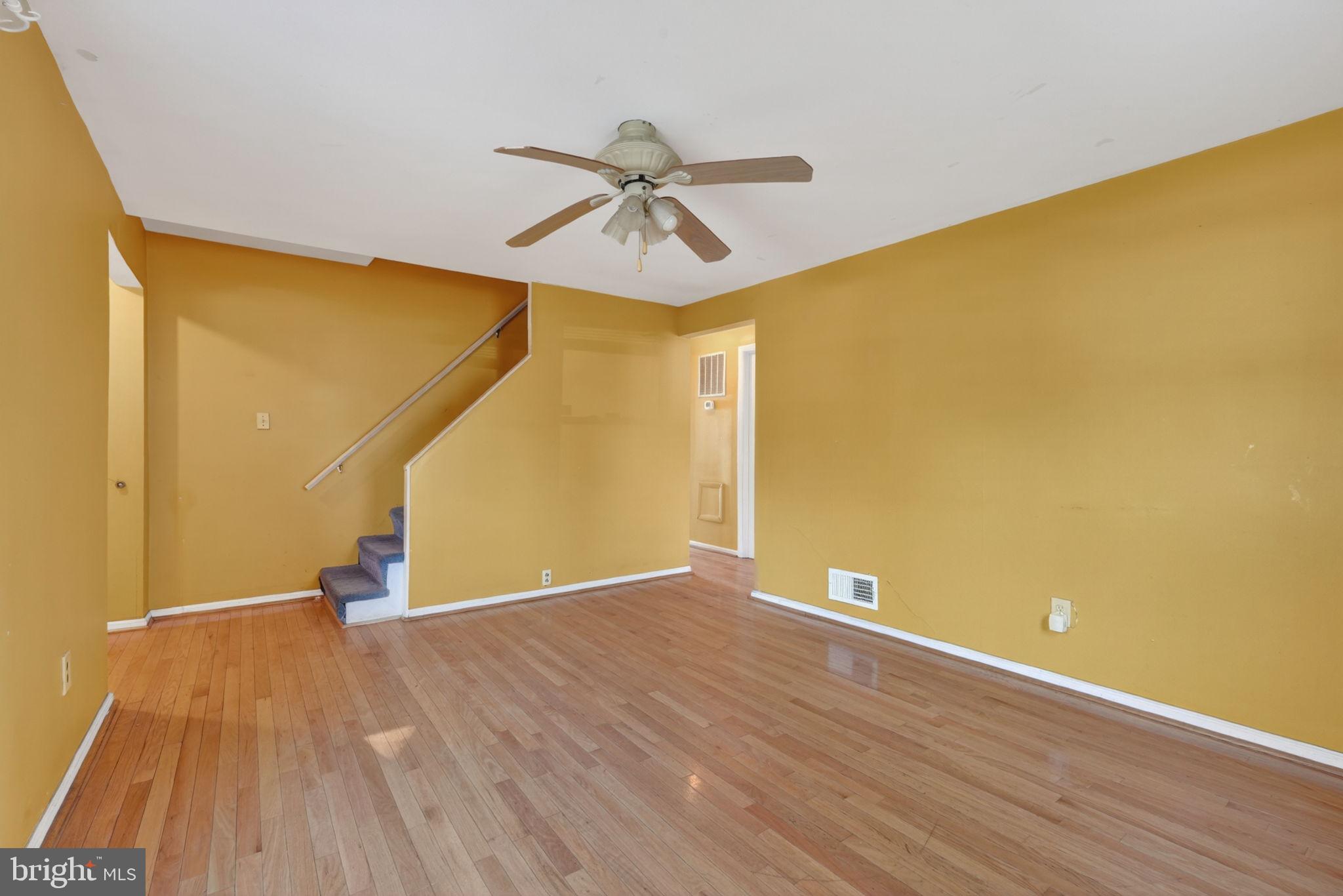 5441 Taussig Road Bladensburg, MD 20710 - Photo 6 of 37 a view of a big room with wooden floor and windows
