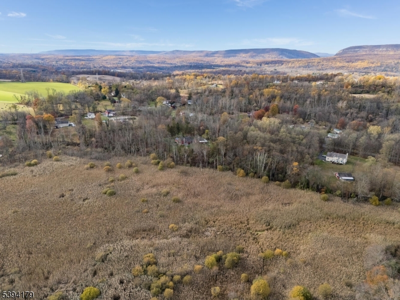 143 Vail Road Columbia, NJ 07832 - Photo 11 of 15 a view of a yard with an ocean beach