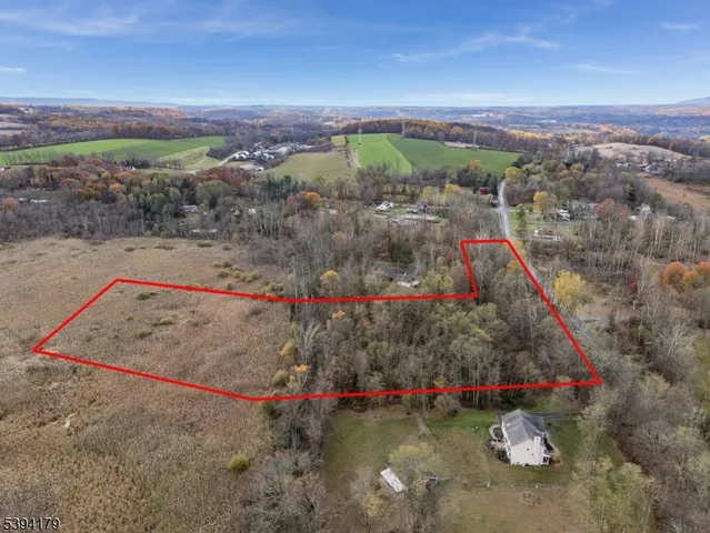 a view of a water with a mountain in the background