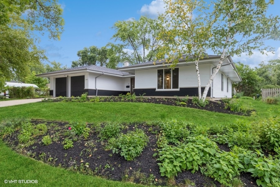 a house view with a garden space