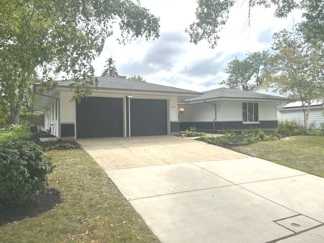 815 Downing Drive Schaumburg, IL 60169 - Photo 8 of 8 a front view of house with yard