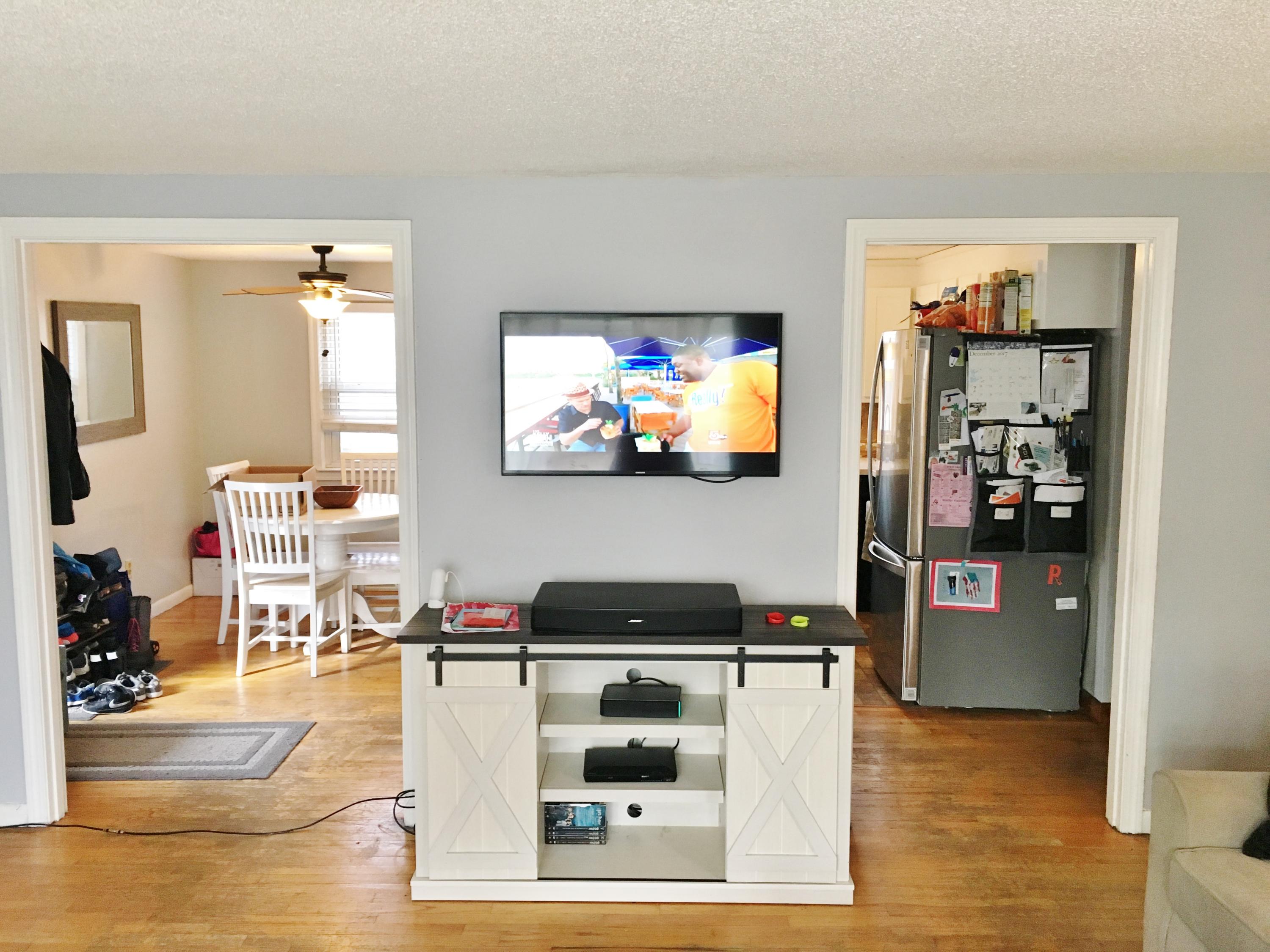 201 Megan Road Hyannis, MA 02601 - Photo 8 of 16 a living room with stainless steel appliances kitchen island granite countertop a stove and a refrigerator