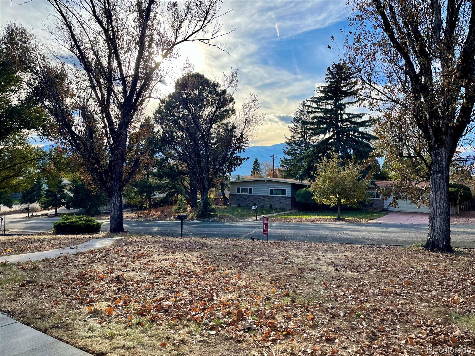 3907 Jasmine Street Colorado Springs, CO 80907 - Photo 23 of 23 a house with trees in the background