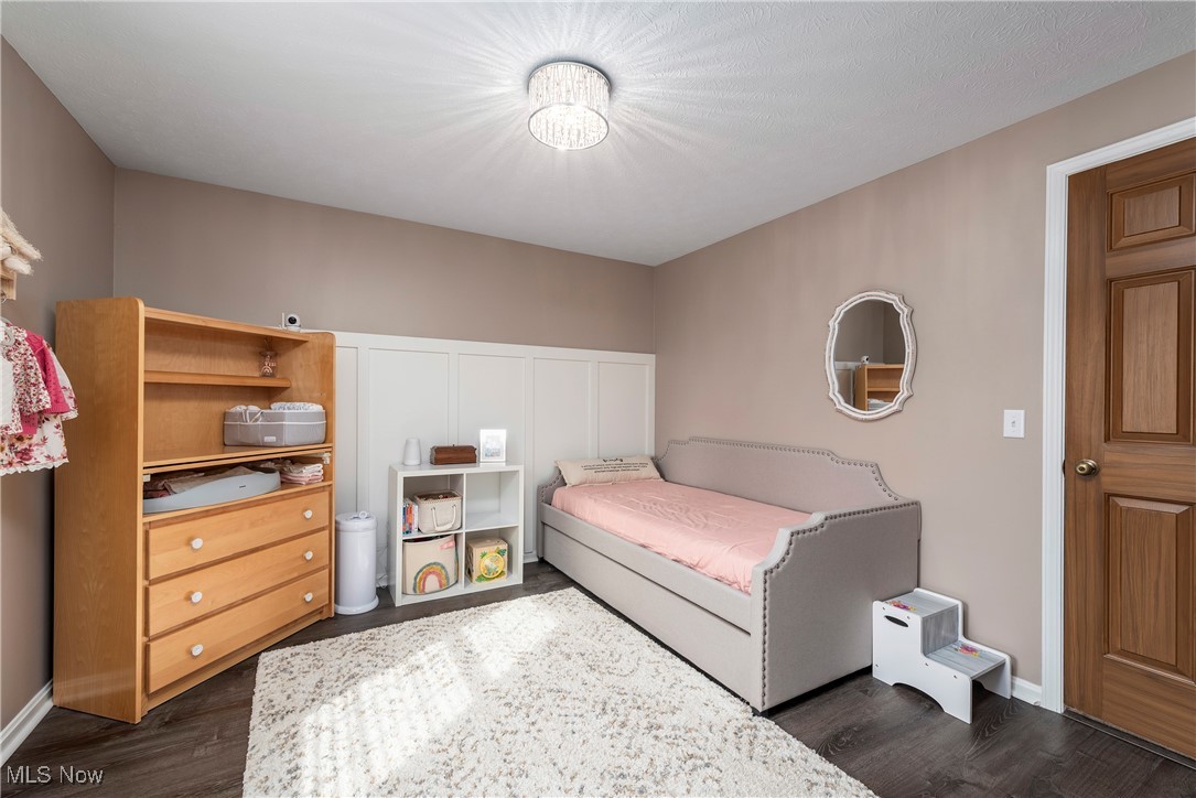 580 Orchardview Road Independence, OH 44131 - Photo 26 of 44 Bedroom with dark wood-style flooring