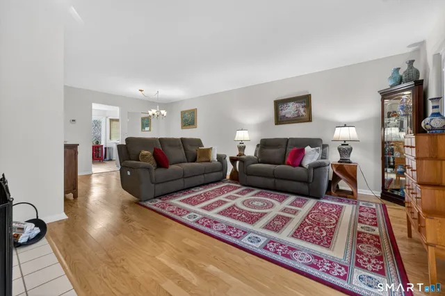 a living room with furniture and a couch
