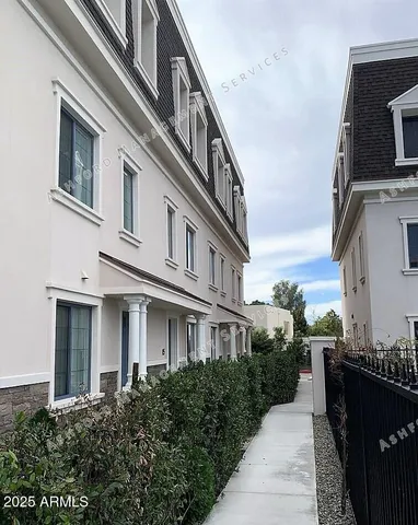 a front view of a multi story residential apartment building