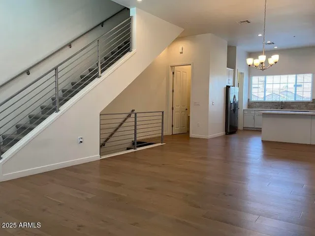 a bathroom with a sink toilet and a mirror