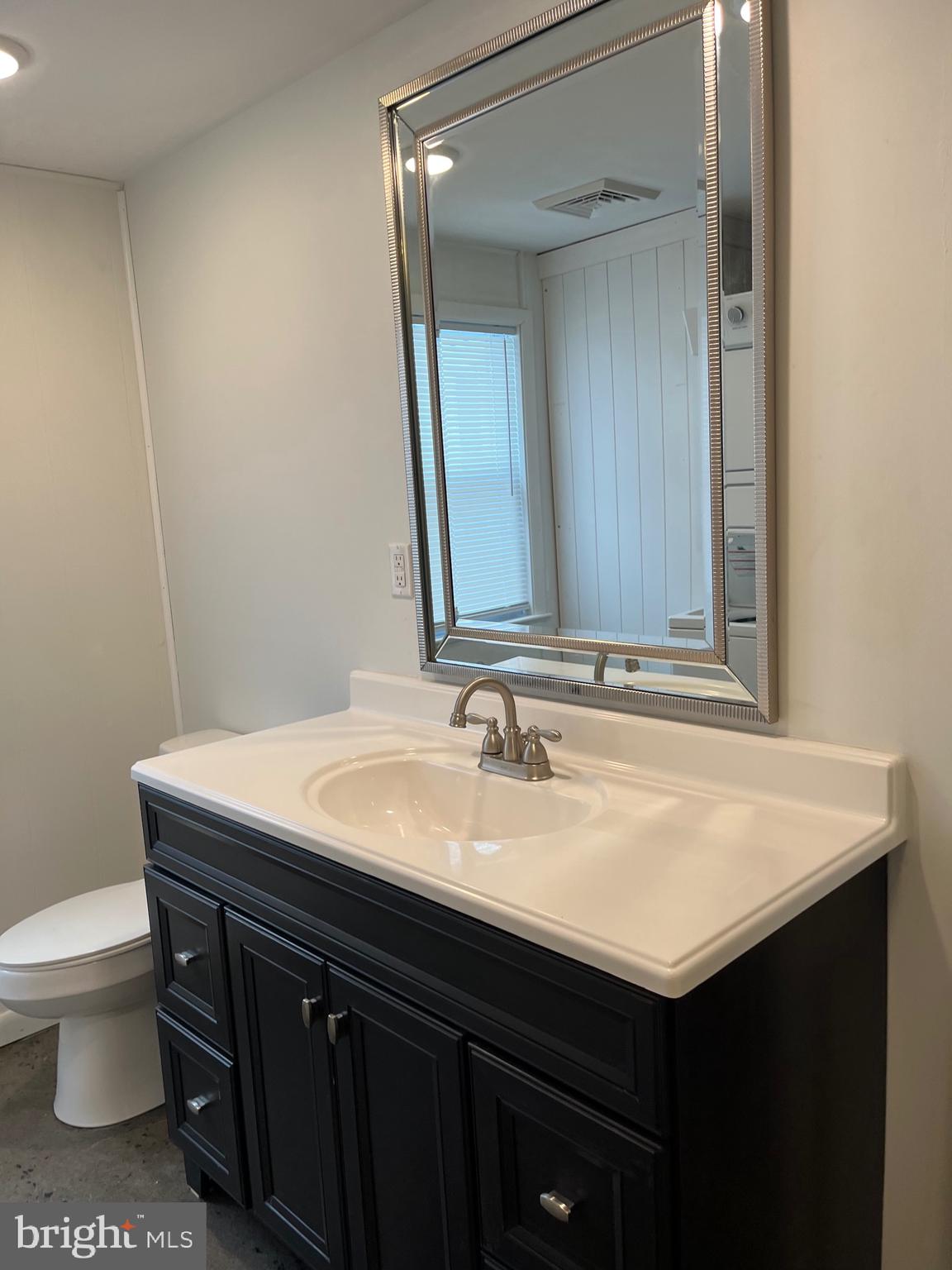 516 Little Britain Church Road Peach Bottom, PA 17563 - Photo 3 of 11 a bathroom with a sink and a toilet